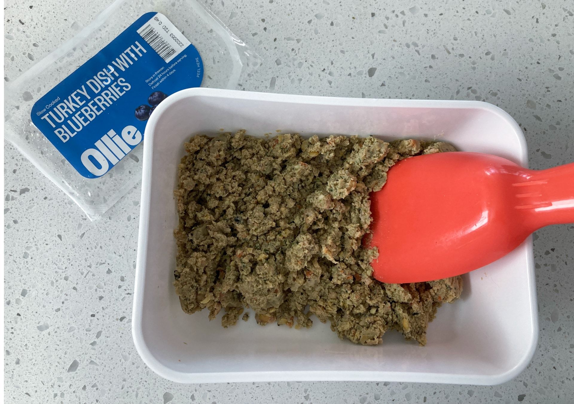 Ollie's 'Turkey with Blueberries' fresh dish in the puptainer